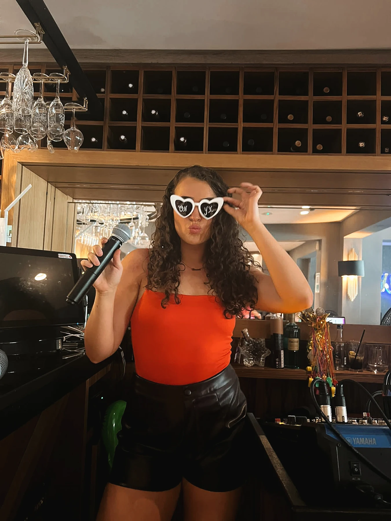 Guest holding a drink inside Onyx
